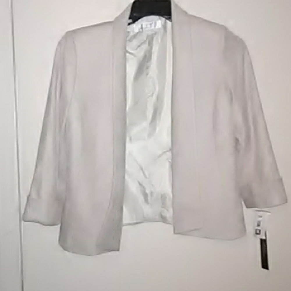Never worn TAHARI dress jacket.